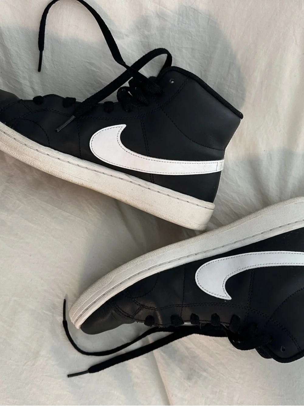Nike Black and White Mid-Top Sneakers with White Swoosh - Picture 2 of 4